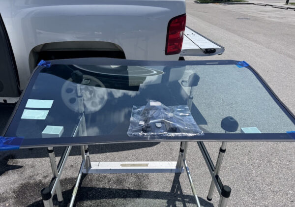 Service Pros Auto Glass technician repairing a windshield